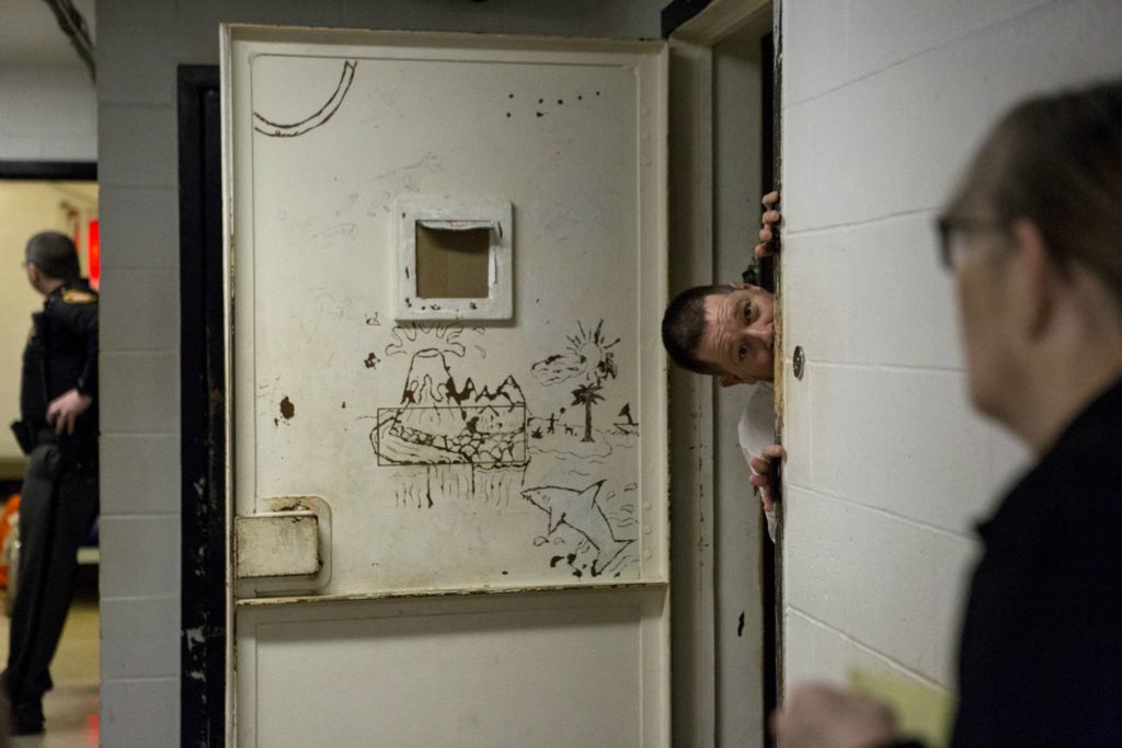 First Place, George S. Smallsreed Jr. Photographer of the Year - Small Market - Jessica Phelps / Newark AdvocateAn inmate, working as a trustee playfully pokes his head out from his 4 man cell in January, 2020. The trustees at the jail can earn time off of their sentence by helping the guards with daily tasks like mopping or helping prepare meals. 