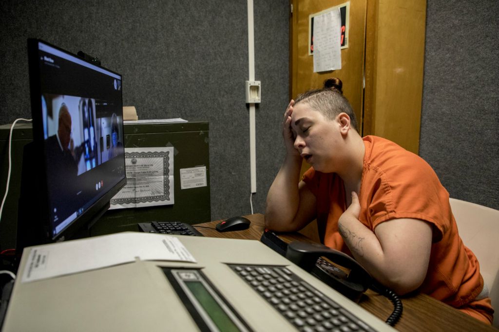 First Place, George S. Smallsreed Jr. Photographer of the Year - Small Market - Jessica Phelps / Newark AdvocateSummer Wood speaks with her attorney, Marie Seiber and Judge Batchelor during her arraignment June 1, 2020. Due to the coronavirus, arraignments are done by video from the Coshocton Justice Center, which can be add stress for inmates trying to navigate the justice system.