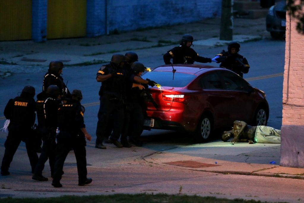 First Place, Spot News - Kareem Elgazzar / The Cincinnati Enquirer, “Standoff”Cincinnati police respond to an "emotionally disturbed" man with a knife on Freeman Avenue, June 27, 2020, in the West End neighborhood of Cincinnati. Police were first alerted of the man at about 5 p.m. and he was later subdued by projectile stun gun, apprehended and taken to University of Cincinnati Medical Center. The man was pacing across Freeman Avenue for several hours.