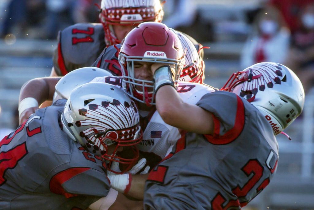 First Place, Ron Kuntz Sports Photographer of the Year - Jessica Phelps / Newark AdvocateRunning back, Garrett Meyers, of Utica lands a punch on Jaden Jacob of Johnstown September 4, 2020. Utica lost to Johnstown 49-21. Utica went on to have a 0-10 season. 