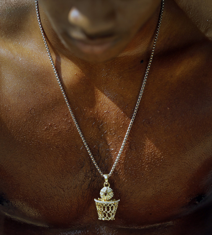 Second Place, Sports Picture Story - Kyle Robertson / The Columbus Dispatch, “Trevell Adams”Columbus South Trevell Adams takes a break after running two miles during summer workout at Fairwood Park in Columbus on August 20, 2019. 