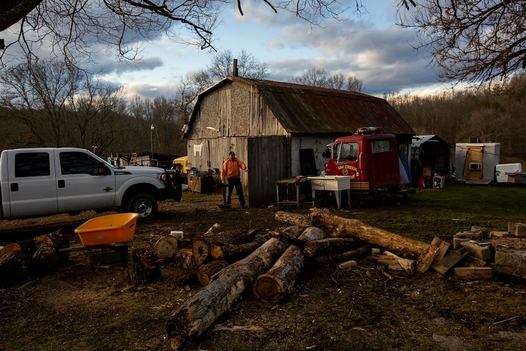 Second place, Chuck Scott Student Photographer of the Year - Chris Day / Ohio UniversityBoyd Montle closes the barn door before going into his house outside New Marshfield on Monday, March 1, 2021. The farm has been in Montle's family for over 100 years. He and his wife Jill own a wood bundling business and also raise cattle to be butchered and sold. "Some days all you're doing is keeping your head above water... just the tip of the nose," Jill Montle said about life on the farm. "Other days you realize you have abundant blessings."