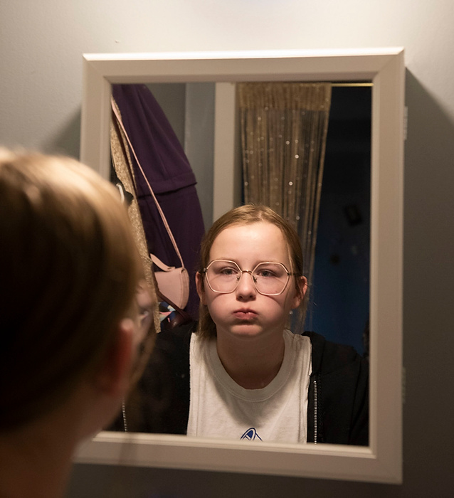 Award of Excellence, Feature Picture Story - Alie Skowronski / Ohio University, "New Normal"Joslynn rinses with mouthwash to treat open sores in her mouth at home in Wheelersburg, Ohio, on June 7, 2021. Joslynn takes anti-reject medication everyday for Keira’s liver that now inhabits her body, and she used to take oral chemo to prevent the cancer form coming back. Both medications can cause open sores to form in her mouth.