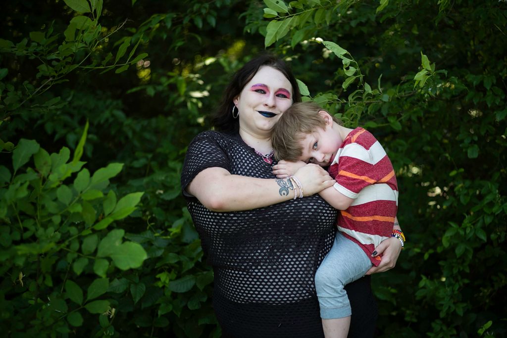 First place, Photographer of the Year - Large Market - Joshua A. Bickel / The Columbus DispatchAlison Chesnut poses for a portrait with her son, Tyrian, 3, on June 14, 2021 at Adams Lake State Park in West Union, Ohio. Chestnut, who has lived in Appalachian West Union her whole life, came out as bisexual as a teenager. "Often times people do feel like they want to move somewhere else, go to bigger city, find more support and opportunities for romantic partners," she said. "But a lot of people find they lack of sense of belonging in urban spaces because of their rural identity." Her family, friends and community are overwhelmingly supportive and accepting of her. "There are still gonna be people who are going to be rude, hateful and homophobic, but when you get to the meat of everything we build these tight-knit communities and we look out for each other," she said.