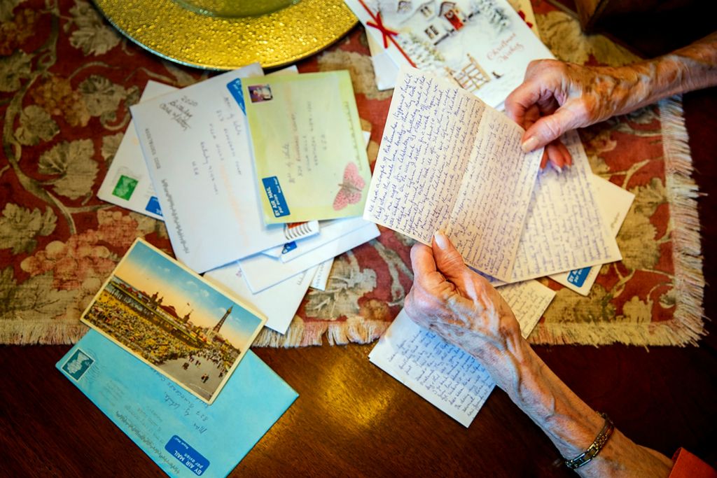 Second place, Photographer of the Year - Large Market - Meg Vogel / The Cincinnati EnquirerGarnetta "Garri" White, 92, reads letters from her pen pal Doreen Samuel in Liverpool, England, on Wednesday, June 30, 2021 in her home in Villa Hills, Ky. White started writing to Doreen when she was 11 in 1939 through her Girl Scout Troop. The pen pals have exchanged letters every other month for over 80 years. 