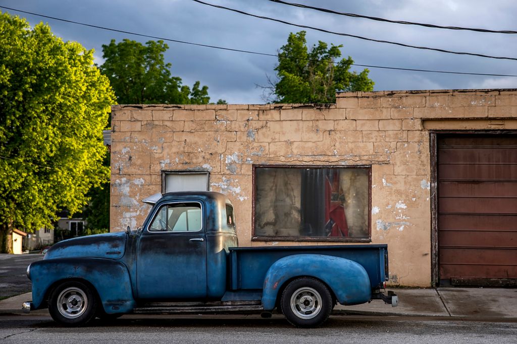 Second place, Photographer of the Year - Large Market - Meg Vogel / The Cincinnati EnquirerA truck parks on Pearl Street in Laurel, Indiana on Monday, June 7, 2021. Franklin County has 23,000 residents. Fear, distrust and politics still dominate conversations about the COVID-19 vaccine among Franklin County's residents, complicating the job of public health officials, who worry the growing gap in America between communities with high and low vaccination rates will keep the pandemic going for years.