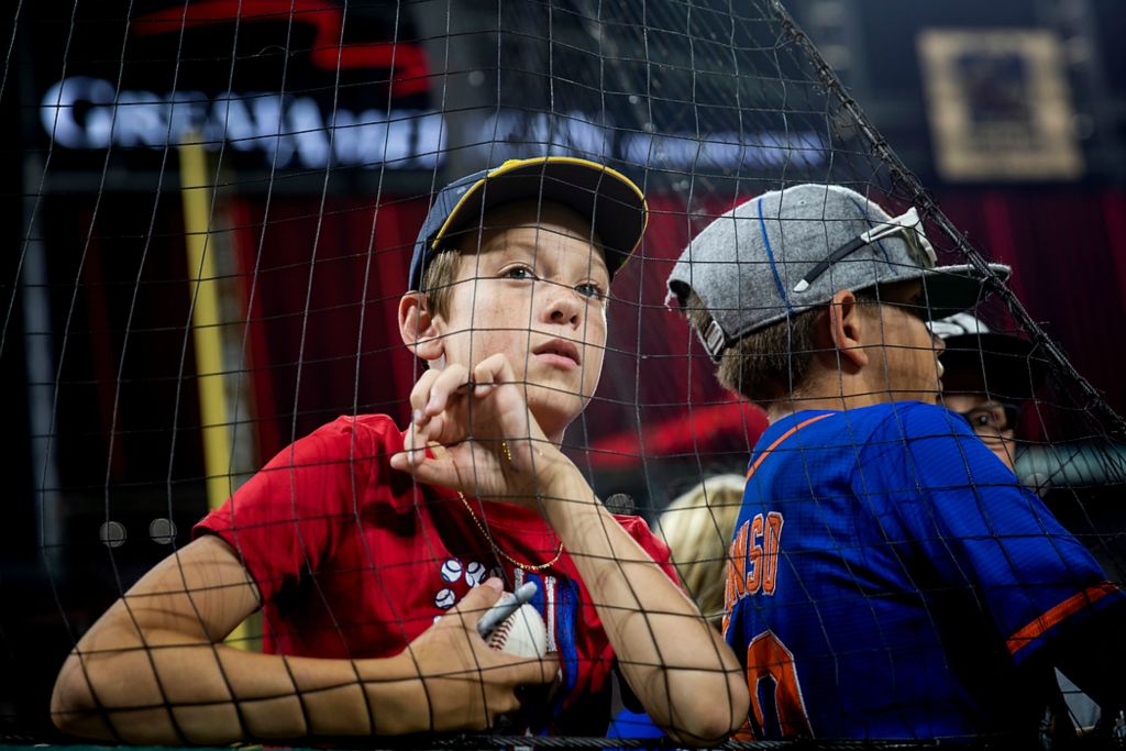 Second place, Photographer of the Year - Large Market - Meg Vogel / The Cincinnati EnquirerYoung fans wait for autographs after the New York Mets beat the Cincinnati Reds 15-11 in 11 innings, Monday, July 19, 2021 at Great American Ball Park in Cincinnati.