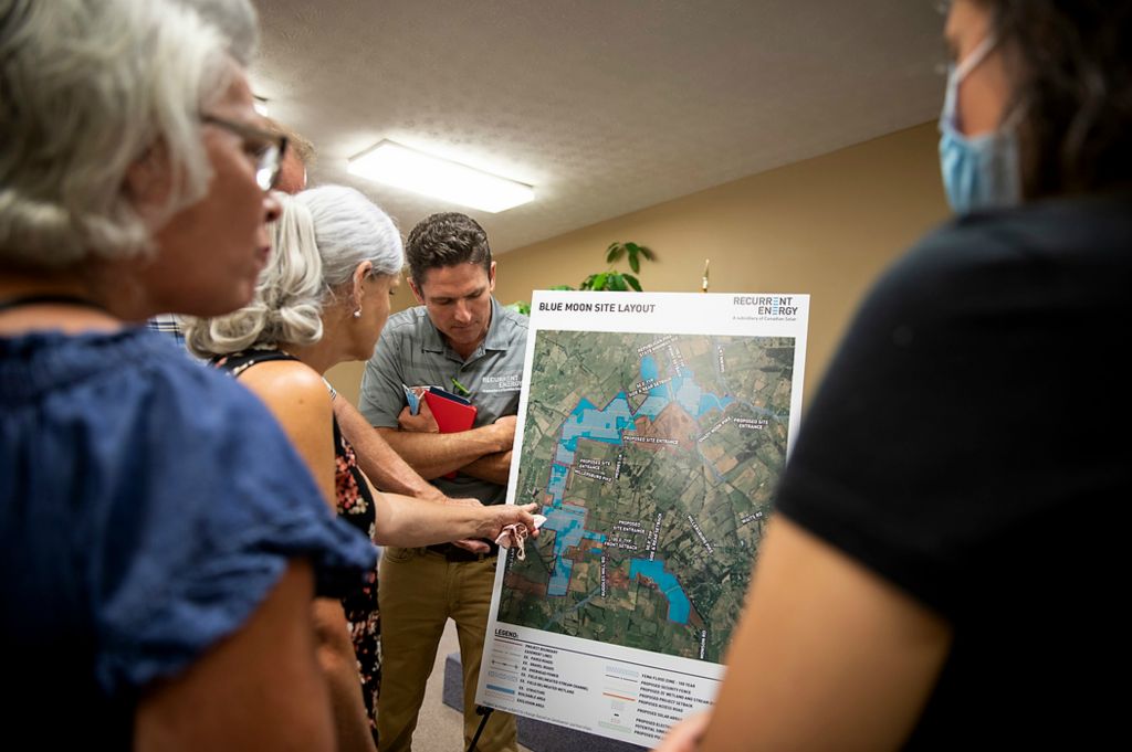 Second place, Photographer of the Year - Large Market - Meg Vogel / The Cincinnati EnquirerCommunity members ask questions about a proposed solar facility during a Recurrent Energy information session at the Harrison County Cooperative Extension Office in Cynthiana, Ky., on Wednesday, August 25, 2021. 