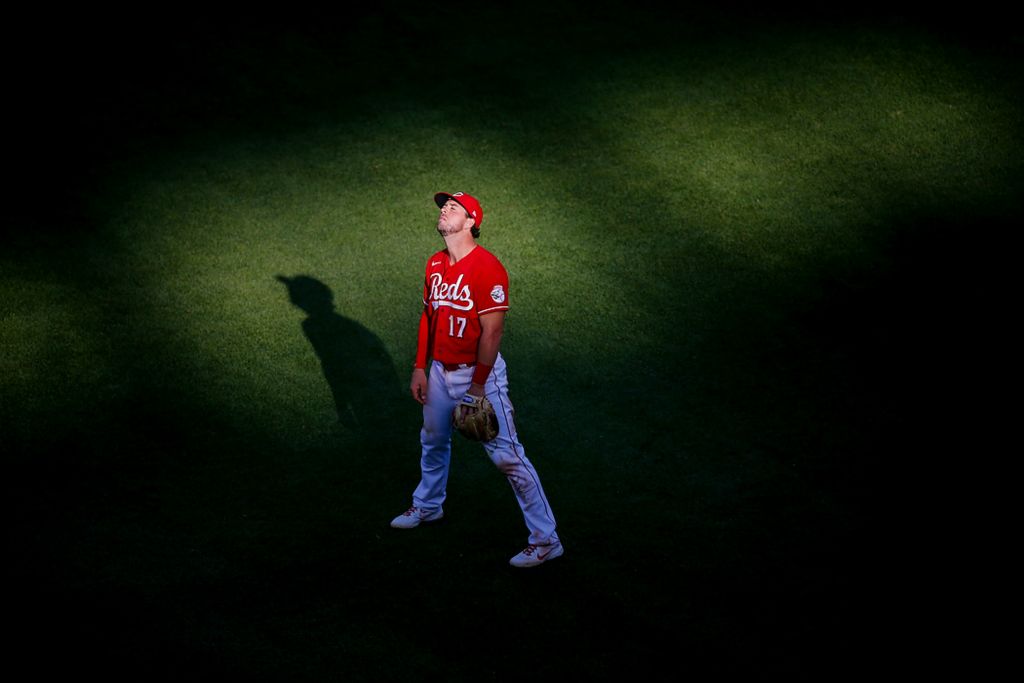 Second place, Photographer of the Year - Large Market - Meg Vogel / The Cincinnati EnquirerCincinnati Reds shortstop Kyle Farmer (17) closes his eyes between plays stands in the outfield during the seventh inning of the baseball game against the Chicago Cubs, May 1, 2021, at Great American Ball Park in Cincinnati.