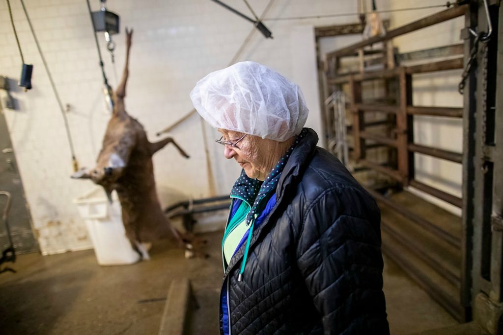 Third place, Photographer of the Year - Large Market - Adam Cairns / The Columbus DispatchLinda Oiler, 81, the owner of Oiler Meat Processing, walks past a deer waiting to be processed for Farmers and Hunters Feeding the Hungry inside the Utica shop on Jan. 26, 2021. Oiler, who started the business in 1974 with her husband Carmel, plans to retire at the end of the month. 