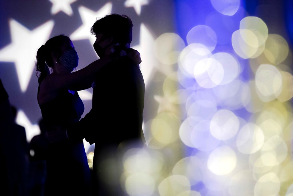 Third place, Photographer of the Year - Large Market - Adam Cairns / The Columbus DispatchMadi Brokaw, 18, dances with Austin Newland, 17, both seniors, dance during the Hilliard Darby High School prom at The Exchange at Bridge Park in Dublin on May 1, 2021. 