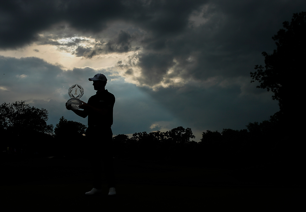 Third place, Photographer of the Year - Large Market - Adam Cairns / The Columbus DispatchPatrick Cantlay hoists the trophy after beating Collin Morikawa in a playoff to win the Memorial Tournament at Muirfield Village Golf Club in Dublin, Ohio on June 6, 2021. 