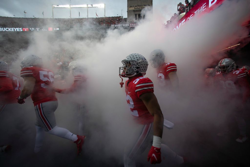 Third place, Photographer of the Year - Large Market - Adam Cairns / The Columbus DispatchOhio State running back TreVeyon Henderson (32) and the Buckeyes take the field prior to the NCAA football game against the Purdue Boilermakers at Ohio Stadium in Columbus on Nov. 13, 2021. 