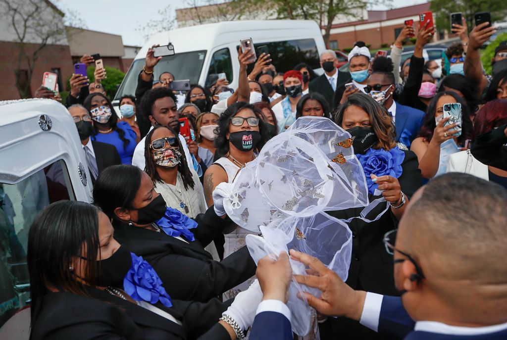 Third place, Photographer of the Year - Large Market - Adam Cairns / The Columbus DispatchButterflies are released by family members following the funeral services for Ma'Khia Bryant at the First Church of God in Columbus on April 30, 2021. Bryant, 16, was shot and killed by a Columbus Police officer on April 20 during an altercation at her foster home on the Southeast Side.