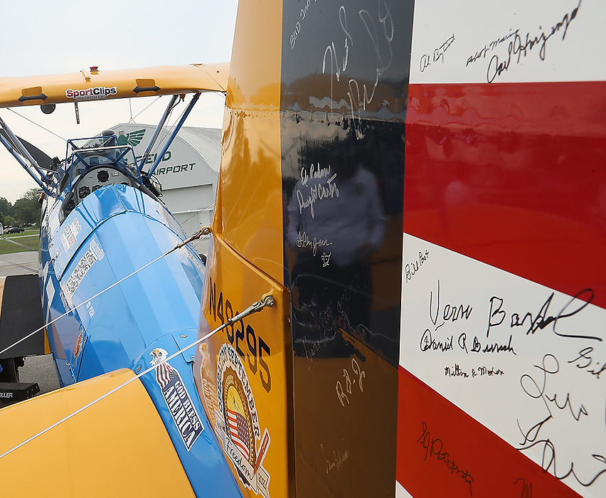 First place, Photographer of the Year - Small Market - Bill Lackey / Springfield News-SunAll the veterans are encouraged to sign the tail of the plane after their Dream Flight. 