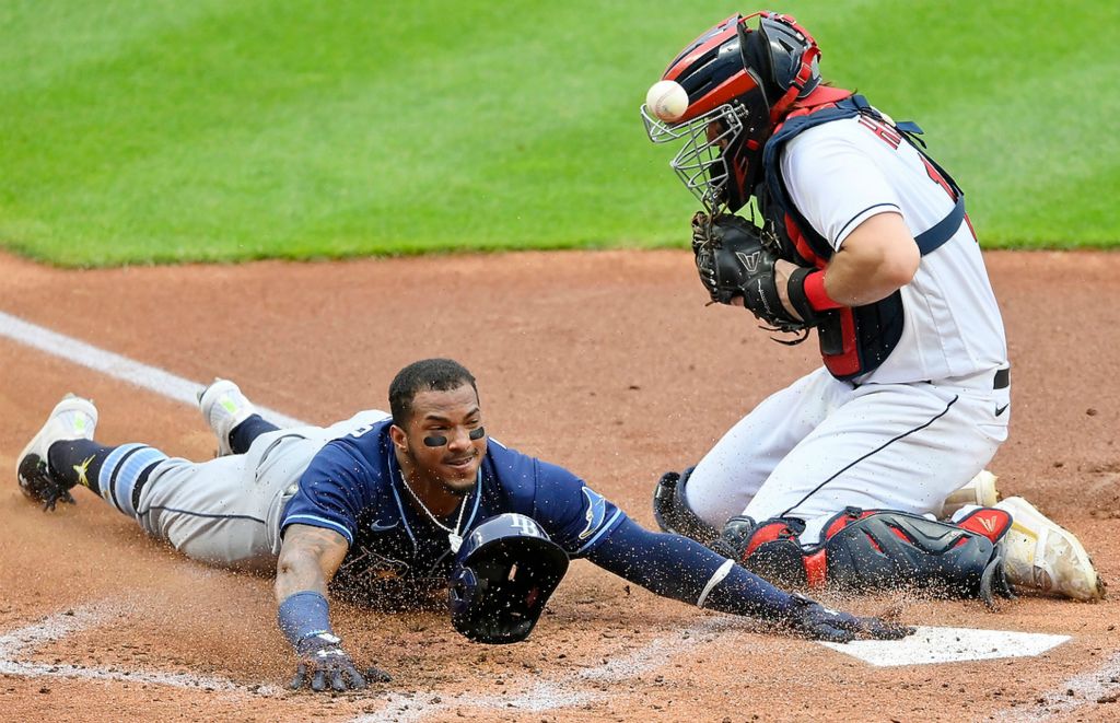 First place, Sports Action - David Richard / Freelance, "Safe at Home"Tampa Bay Rays shortstop Wander Franco scores beside Cleveland Indians catcher Austin Hedges.