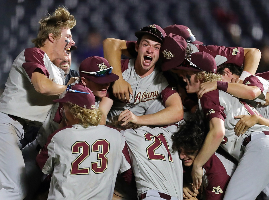 Third place, Sports Feature - Jeff Lange / Akron Beacon Journal, "State Champs"New Albany players celebrate after winning the OHSAA Division I state championship at Canal Park on June 13, 2021, in Akron.