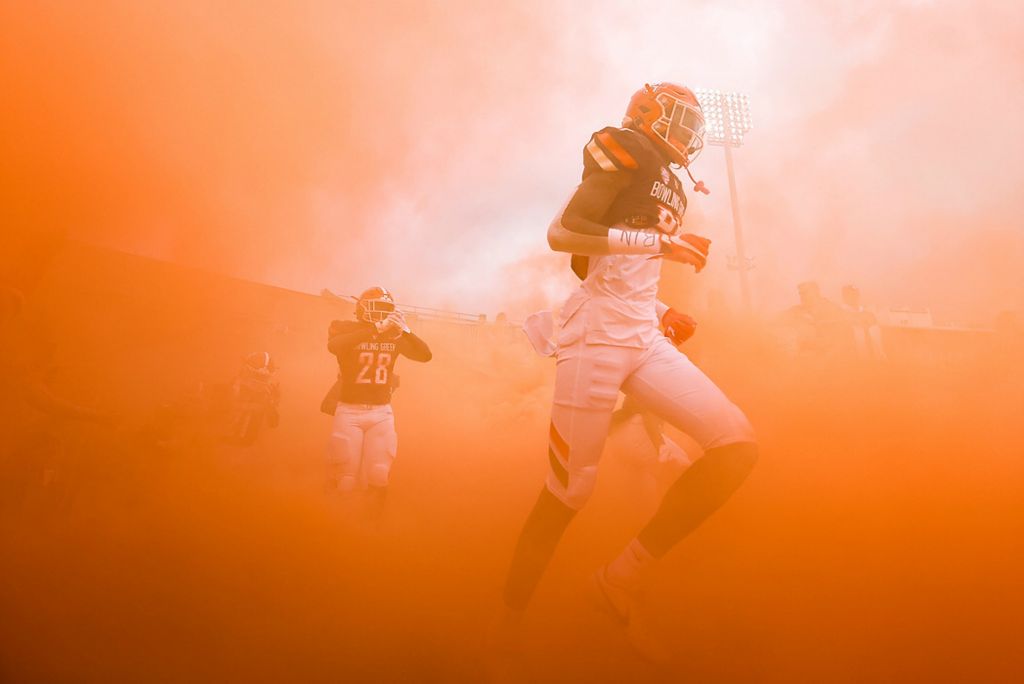 First place, Ron Kuntz Sports Photographer of the Year - Rebecca Benson / The BladeBowling Green enters the field before the start of a MAC football game against Eastern Michigan at Doyt Perry Stadium in Bowling Green on October 23, 2021. 