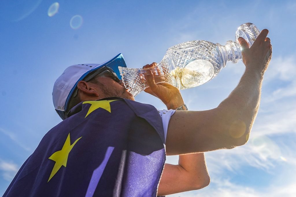 First place, Ron Kuntz Sports Photographer of the Year - Rebecca Benson / The BladeA Team Europe caddie drinks champagne from the Solheim Cup to celebrate his teams 15-13 win over Team USA during the trophy presentation for the 2021 Solheim Cup at Inverness Club in Toledo on September 6, 2021. 