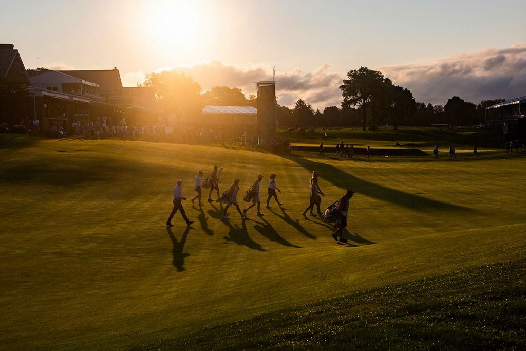 First place, Ron Kuntz Sports Photographer of the Year - Rebecca Benson / The BladeGolfers and their caddies make their way across the #1 fairway to during the second round of the 2021 Solheim Cup at Inverness Club in Toledo on  September 5, 2021. 