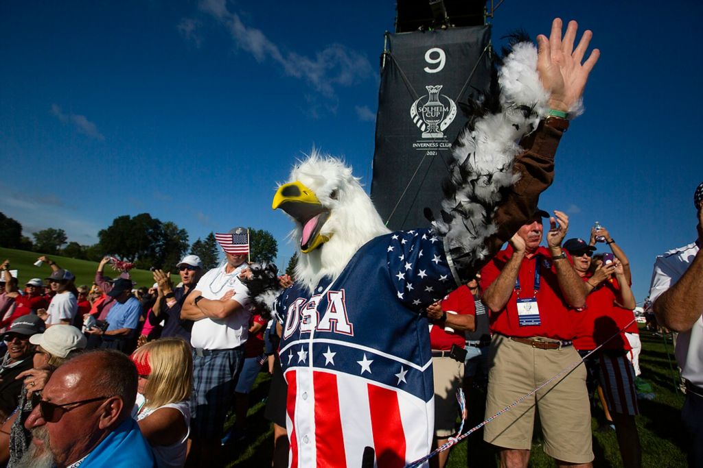 First place, Ron Kuntz Sports Photographer of the Year - Rebecca Benson / The BladeFrank Pratt, of Lincoln, Neb., wears a bald eagle costume and flaps his arms as players approach the ninth green during the second round of the 2021 Solheim Cup at Inverness Club in Toledo on September 5, 2021. 