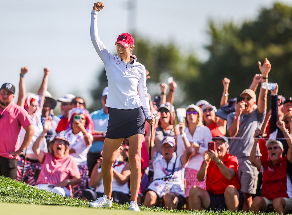First place, Ron Kuntz Sports Photographer of the Year - Rebecca Benson / The BladeTeam USA Nelly Korda celebrates her putt on the 13th hole during the second round of the 2021 Solheim Cup at Inverness Club in Toledo on September 5, 2021. 