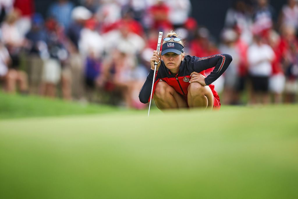 First place, Ron Kuntz Sports Photographer of the Year - Rebecca Benson / The BladeTeam USA’s Jessica Korda lines up her shot during the first round of the 2021 Solheim Cup at Inverness Club in Toledo on September 4, 2021. 