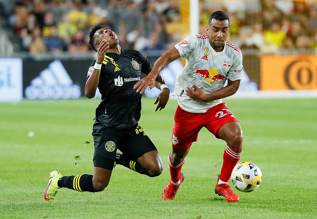 Second place, Ron Kuntz Sports Photographer of the Year - Adam Cairns / The Columbus DispatchColumbus Crew midfielder Luis Diaz (12) collides with New York Red Bulls midfielder Cristian Casseres Jr (23) during the first half of the MLS soccer game at Lower.com Field in Columbus on Sept. 14, 2021. 