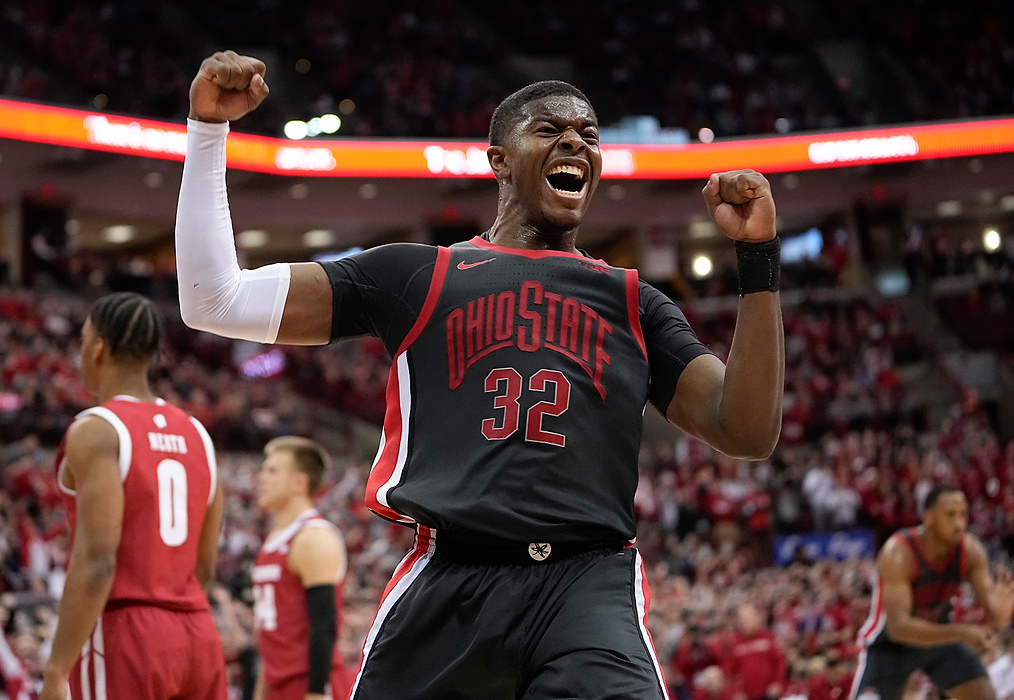 Second place, Ron Kuntz Sports Photographer of the Year - Adam Cairns / The Columbus DispatchOhio State Buckeyes forward E.J. Liddell (32) celebrates making a shot and getting fouled during the second half of the NCAA men's basketball game against the Wisconsin Badgers at Value City Arena in Columbus on Dec. 11, 2021.