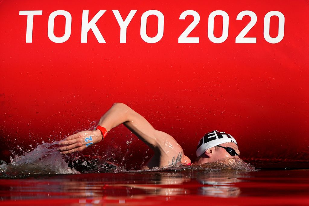 Third place, Ron Kuntz Sports Photographer of the Year - Kareem Elgazzar / The Cincinnati EnquirerFlorian Wellbrock (GER) circles a buoy as he competes in the men's 10km marathon swimming competition during the Tokyo 2020 Olympic Summer Games, Aug. 5, 2021, at Odaiba Marine Park in Tokyo, Japan. Wellbrock won gold in the event.