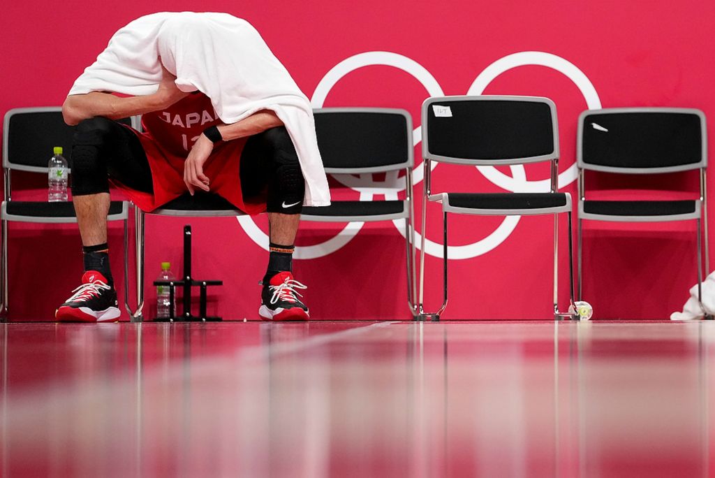 Third place, Ron Kuntz Sports Photographer of the Year - Kareem Elgazzar / The Cincinnati EnquirerJapan player Yuta Watanabe (12) sits on the bench after Japan lost to Argentina during the Tokyo 2020 Olympic Summer Games on Aug. 1, 2021, at Saitama Super Arena. The loss ended the team’s Olympic Games.