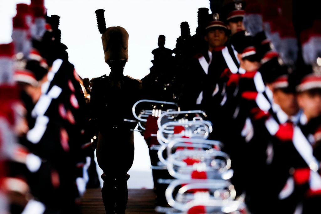 First place, Sports Picture Story - Joshua A. Bickel / The Columbus Dispatch, “Austin Bowman Leads the Way”Ohio State University Marching Band Drum Major Austin Bowman waits to run down the ramp for his entrance as pregame starts. "Austin will be remembered for putting on a damn good show," former drum major Konner Barr said. "When his time comes to an end, he will have left an impact not only on the fans, but he will have inspired so many kids to become future drum majors themselves."