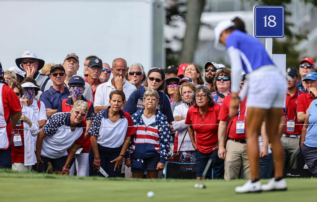 Award of Excellence, Sports Picture Story - Jeremy Wadsworth / The Blade, “Solheim Cup”Fans watch intently as Celine Boutier of Team Europe putts on the 18th hole during the first round of the Solheim Cup Saturday, September 4, 2021, at the Inverness Club in Toledo. 
