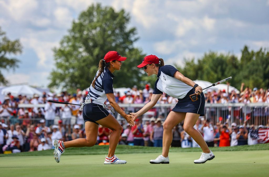 Award of Excellence, Sports Picture Story - Jeremy Wadsworth / The Blade, “Solheim Cup”Danielle Kang, left, and Austin Ernst celebrate Ernst’s birdie on the fifth hole during the second round of the Solheim Cup on September 5, 2021, at the Inverness Club in Toledo. 