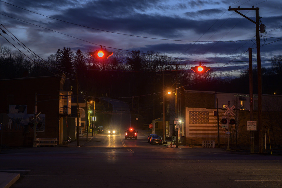 Student Photographer of the Year - First Place, Akash Pamarthy / Ohio UniversityAs the sun sets, downtown Corning comes to a halt. For the most part, the village is deafeningly quiet. People get up early for bed and go to bed early in order to be on time for work the next day. 