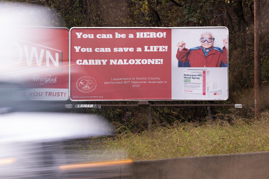 Student Photographer of the Year - Second Place, Joe Timmerman / Ohio UniversityA billboard alongside US-52 heading west from New Boston to Portsmouth reads, “You can be a hero! You can save a life! Carry Naloxone! Laypersons in Scioto County performed 1617 Naloxone reversals in 2021.” The billboard is sponsored by Scioto Connect, a non-profit organization in Scioto County.  