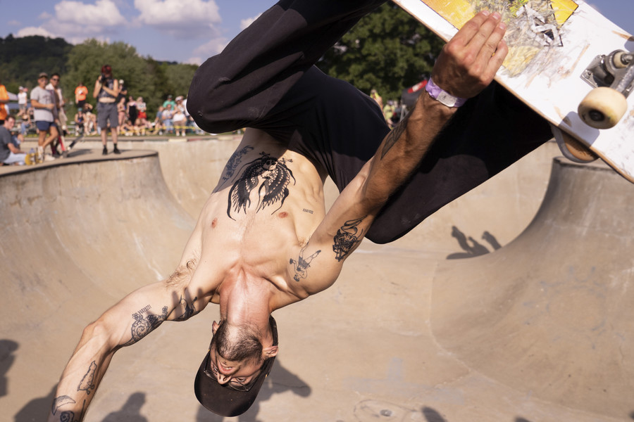 Student Photographer of the Year - Second Place, Joe Timmerman / Ohio UniversityEmmett Covington, 25, of Athens prepares to land a tatted up eggplant trick during Skate Jam’s deep end bowl competition in Athens. Covington started skating in Athens at age seven and went on to win one of Skate Jam’s top prizes for the deep end bowl competition. 
