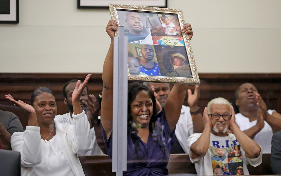 General News - Third Place, “Shawn Allen Sentencing”Carmon Lee (center) and other family members of Horace Lee and Azariah Tucker rejoice as Shawn Allen is sentenced to 63 years to life in prison for the hit-and-run murders of the Akron man and his 21-month-old daughter in Summit County Common Pleas Court in Akron. (Jeff Lange / Akron Beacon Journal)