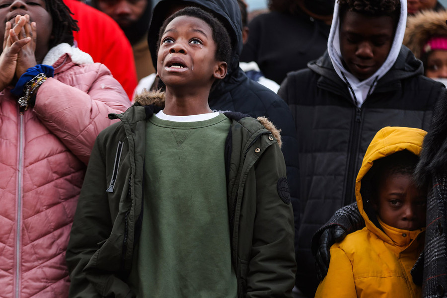General News - Second Place, “Vigil”Julian Gittens, 11, cries as he talks about the good times he had with his sister, 10-year-old Damia Ezell, who was killed in a drive-by shooting during her vigil in Toledo. (Rebecca Benson / The Blade)