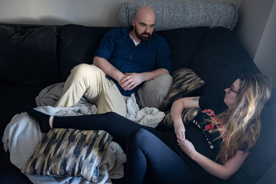 News Picture Story - Award of Excellence, “Rejoining the Joints”Hunter Severns, of Toledo, sit on the couch with his fiancé Lauren Cervetto in their downtown apartment in Toledo. Mr. Severns and Ms. Cervetto have been engaged for about a year now, and Ms. Cervetto is comforted and supported by her relationship with Mr. Severns through her chronic pain management of Ehlers-Danios syndrome.   (Stephen Zenner / The Blade)