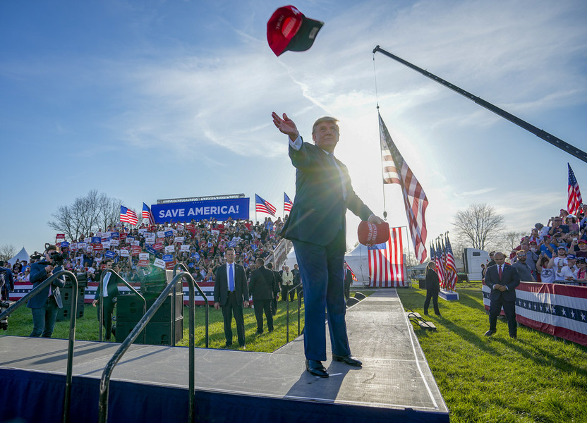 Photographer of the Year - Large Market - First Place, Adam Cairns / The Columbus DispatchFormer President Donald Trump tosses out hats as he takes the stage for a rally at the Delaware County Fairgrounds. 