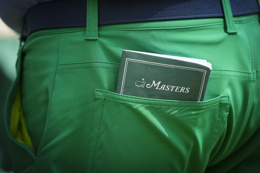 Photographer of the Year - Large Market - First Place, Adam Cairns / The Columbus DispatchA patron carries a course booklet in his green pants during the final round of the Masters Tournament at Augusta National Golf Club. 