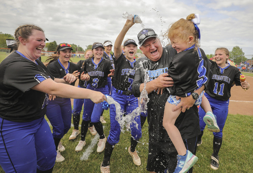Photographer of the Year - Large Market - Second Place, Jeremy Wadsworth / The BladeSpringfield head coach Rob Gwozdz and his granddaughter Hallee Hall, 4, are doused with water after the Blue Devils defeated  Anthony Wayne, 5-4, during an OHSAA Division I regional semifinal softball game at Gibsonburg High School in Gibsonburg.  