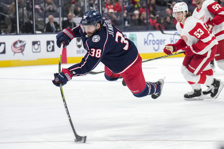 Photographer of the Year - Large Market - Award of Excellence, Joseph Scheller / Ohio UniversityColumbus Blue Jackets forward Boone Jenner (38) spins around to make a shot attempt during the third period of the a game against the Detroit Red Wings at Nationwide Arena in Columbus. 