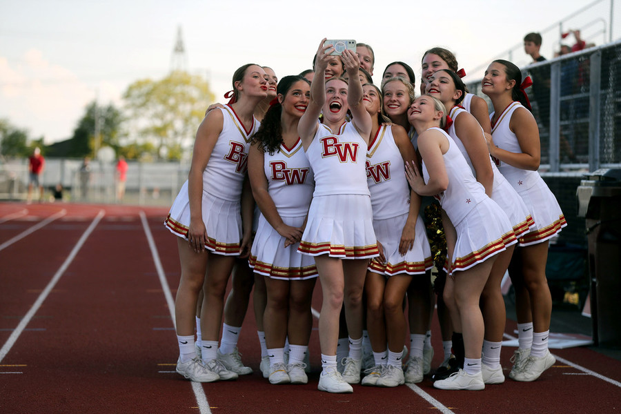 Photographer of the Year - Small Market - First Place, Shane Flanigan / ThisWeek Community NewsJunior Kaitlyn Drake snaps a selfie with her fellow Big Walnut cheerleaders before a game against Hartley at Big Walnut High School in Sunbury. 