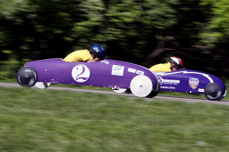 Photographer of the Year - Small Market - First Place, Shane Flanigan / ThisWeek Community NewsDylan Decker, of Pickerington (2), races against Emmy Evans, of Dublin, in the superstock division in the Columbus Soap Box Derby. Winners in each division, stock, superstock and masters, move on to compete in the All-American Soap Box Derby in Akron on July 23. 