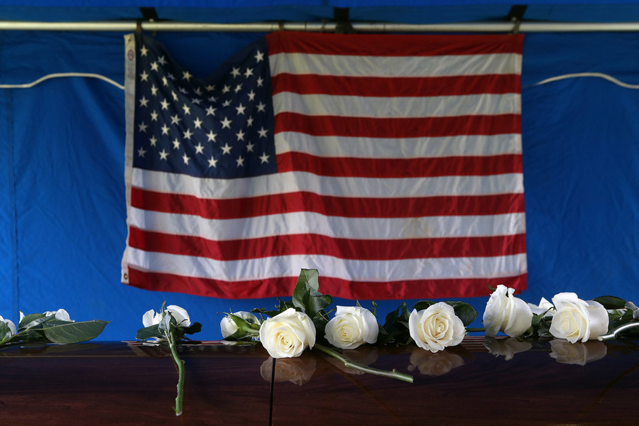 Photographer of the Year - Small Market - First Place, Shane Flanigan / ThisWeek Community NewsWhite roses left by family members line Korean War Army veteran private first class Jack E. Lilley's coffin following a funeral service June 14, 2022, at Northlawn Memory Gardens in Westerville.  