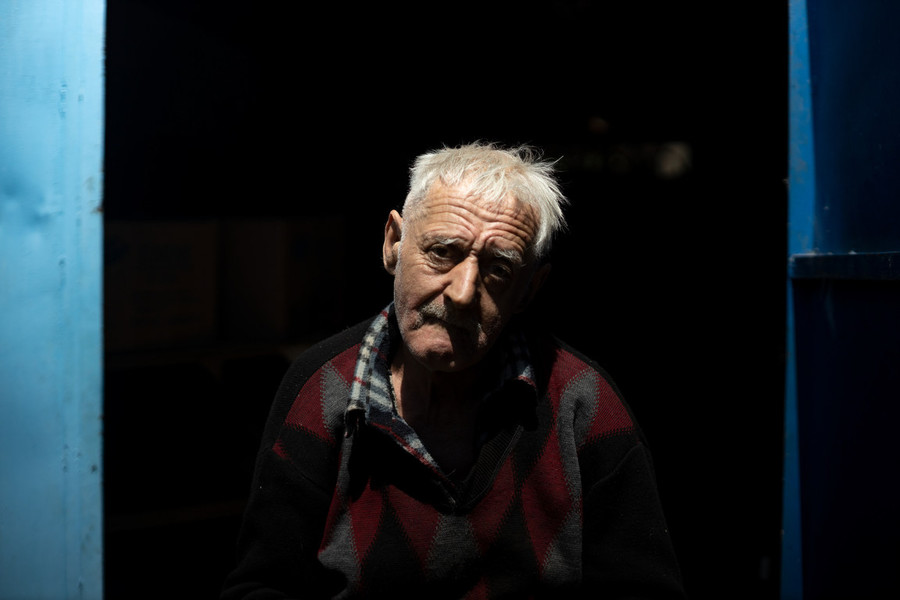 Portrait Personality - Third Place, “Trials of the Age”Vitalli Vasylets, 67, of Katiuzhanka, Ukraine, sits in front of his garage in Katiuzhanka, Ukraine. Vasylets has been visited by Russian soldiers three times since the invasion of Ukraine began in February, but Vasylets sees no point to fleeing his "motherland."  (Stephen Zenner / The Blade)