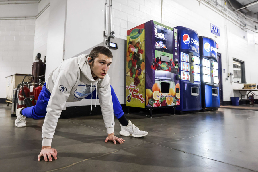 Ron Kuntz Sports Photographer of the Year - Second Place St. Francis De Sales’s Virgil Hoffman IV stretches before the OHSAA state hockey championship game against Gates Mills Gilmour at Nationwide Arena in Columbus.  (Isaac Ritchey / The Blade)