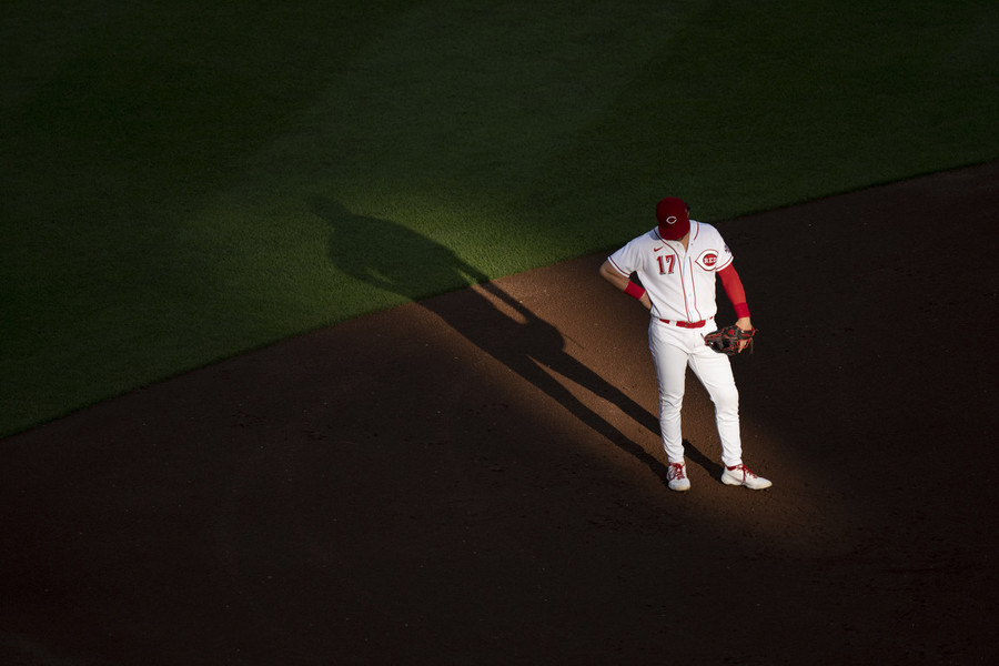 Ron Kuntz Sports Photographer of the Year - Third Place Cincinnati Reds shortstop Kyle Farmer (17) stands in between pitches in the first inning of a game against the St. Louis Cardinals at Great American Ball Park in Cincinnati.  (Albert Cesare / The Cincinnati Enquirer)